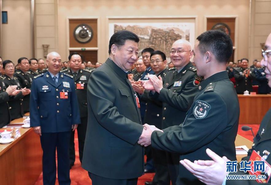  3月12日上午，中共中央總書記、國家主席、中央軍委主席習(xí)近平出席十三屆全國人大一次會議解放軍和武警部隊代表團(tuán)全體會議。